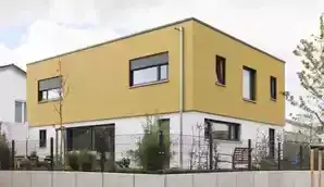 Einfamilienhaus mit Flachdach über zwei Geschossen und großer Fertig-Einzelgarage